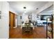 Spacious dining area with elegant lighting and seamlessly connected living spaces at 874 Brevard Ct, Orlando, FL 32822