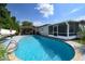 Backyard pool offering a serene outdoor oasis with ample space for relaxation and entertainment at 874 Brevard Ct, Orlando, FL 32822