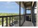 Relaxing balcony with beautiful treetop views and fresh air at 9051 Treasure Trove Ln # 505, Kissimmee, FL 34747