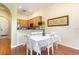 Open dining area with seating for four, connecting to the kitchen at 9051 Treasure Trove Ln # 505, Kissimmee, FL 34747