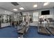 Community gym has treadmills and weight machines to help you stay active at 9051 Treasure Trove Ln # 505, Kissimmee, FL 34747