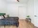 Bright bedroom featuring modern flooring, closet, neutral paint, and ceiling fan at 9942 Hatton Cir, Orlando, FL 32832