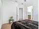 Bright bedroom featuring modern flooring, closet, neutral paint, and en-suite access at 9942 Hatton Cir, Orlando, FL 32832