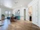 A well-lit dining room boasts an elegant table and access to the backyard at 9942 Hatton Cir, Orlando, FL 32832