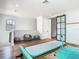 Gym area featuring a balance beam and air track, perfect for gymnastics training at 9942 Hatton Cir, Orlando, FL 32832