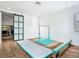 Gym room featuring a variety of equipment, including a balance beam and air track at 9942 Hatton Cir, Orlando, FL 32832