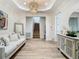 Inviting hallway features stylish decor, hardwood floors, and modern accents at 9942 Hatton Cir, Orlando, FL 32832