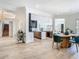 A flowing floorplan offers an open space between the dining area and modern kitchen at 9942 Hatton Cir, Orlando, FL 32832