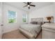 Serene bedroom with neutral tones, natural light, and a comfortable bed, creating a relaxing atmosphere at 1027 Eagle Tree Ln, Sanford, FL 32771