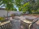 Serene backyard showcasing patio with seating, lush trees, and a peaceful atmosphere at 1041 N Fern Creek Ave, Orlando, FL 32803