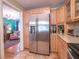 Spacious kitchen featuring stainless steel refrigerator and ample counter space at 1041 N Fern Creek Ave, Orlando, FL 32803