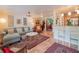 Open-concept living area seamlessly connects to the kitchen and adjoining rooms at 1041 N Fern Creek Ave, Orlando, FL 32803