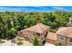 Beautiful home with mature trees and a well-kept yard, aerial view showing the Orlando skyline at 1046 Morris Ave # 1046, Orlando, FL 32803