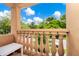 Picturesque balcony view showcasing the neighborhood with stucco balusters and a table at 1046 Morris Ave # 1046, Orlando, FL 32803