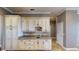 Convenient kitchen area featuring granite countertops and ample cabinet space at 10809 Arrowtree Blvd, Clermont, FL 34715