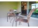 Relaxing patio with a view of the lawn at 130 Claire Ln, Davenport, FL 33837
