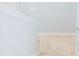 Clean staircase with carpet steps and white walls at 130 Claire Ln, Davenport, FL 33837