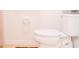Close-up of a well-maintained white toilet, showing the clean and functional bathroom space at 130 Claire Ln, Davenport, FL 33837