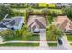 Aerial view of the home surrounded by lush trees and mature landscaping at 1415 Ellis Fallon Loop, Oviedo, FL 32765