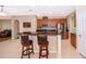 Kitchen island with granite countertops, stainless steel appliances, and wood cabinetry at 1415 Ellis Fallon Loop, Oviedo, FL 32765