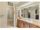 Bathroom features include a single sink vanity with a wood countertop and plenty of storage at 142 Florence Blvd, Debary, FL 32713