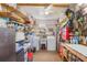 Spacious utility room with laundry and storage shelves at 142 Florence Blvd, Debary, FL 32713