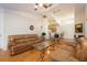 Inviting living room showcasing an open floor plan, hardwood floors, and comfortable seating, ideal for entertaining guests at 14224 Colonial Lakes Dr, Orlando, FL 32826