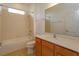 Bathroom with a tub, shower, and vanity with a single sink at 147 Seville Dr, Davenport, FL 33837