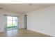 Spacious living room with sliding glass doors offering outdoor views at 147 Seville Dr, Davenport, FL 33837