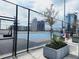 Basketball court area with metal fence overlooking city skyline at 150 E Robinson St # 419, Orlando, FL 32801
