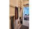 Walk-in closet with custom shelving and rod system adjacent to bedroom with city views at 150 E Robinson St # 419, Orlando, FL 32801