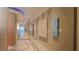 Hallway features neutral color palette with artwork and accent lighting at 150 E Robinson St # 419, Orlando, FL 32801