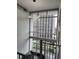 Upper level living space with city views through large windows, spiral staircase and modern lighting at 150 E Robinson St # 419, Orlando, FL 32801