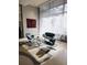 Bright lobby area with modern furniture and large windows at 150 E Robinson St # 419, Orlando, FL 32801