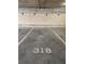 Designated parking space, number 318, in a well-maintained parking area, providing convenience for residents at 150 E Robinson St # 419, Orlando, FL 32801