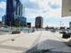 Spacious rooftop deck with lounge chairs and skyline views at 150 E Robinson St # 419, Orlando, FL 32801