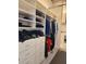 A walk-in closet provides ample storage and organization with shelving and hanging space at 150 E Robinson St # 419, Orlando, FL 32801