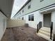 Cozy backyard with a paved patio, perfect for outdoor entertaining and relaxation at 15316 Burgtheater Dr, Winter Garden, FL 34787