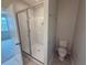 Shower bathroom with glass shower, and neutral decor at 15316 Burgtheater Dr, Winter Garden, FL 34787