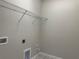 Laundry room with tile flooring and shelving at 15316 Burgtheater Dr, Winter Garden, FL 34787