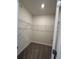 Spacious walk-in closet with metal shelving for optimal organization at 1727 Buckeye Rd, Davenport, FL 33837