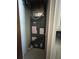 HVAC system in small closet with exposed piping and multiple warning labels at 1812 Firwood Ct, Orlando, FL 32818