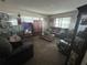 Comfortable living room with cozy furniture and natural light at 1812 Firwood Ct, Orlando, FL 32818