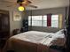 Inviting bedroom with ceiling fan and great natural light at 1812 Firwood Ct, Orlando, FL 32818