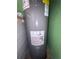 A standard hot water heater provides reliable hot water throughout the home at 1812 Firwood Ct, Orlando, FL 32818