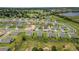 New construction neighborhood with pond and golf course in distance at 2168 Aibonito Cir, Clermont, FL 34711