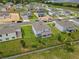 Suburban homes under construction with large lawns near a pond at 2168 Aibonito Cir, Clermont, FL 34711