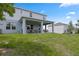 Spacious backyard with a covered patio, perfect for outdoor living at 2168 Aibonito Cir, Clermont, FL 34711