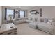 Spacious living room with a large sectional sofa and decor at 2168 Aibonito Cir, Clermont, FL 34711