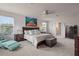 Serene main bedroom with a large bed, soft colors, and ample natural light at 2168 Aibonito Cir, Clermont, FL 34711